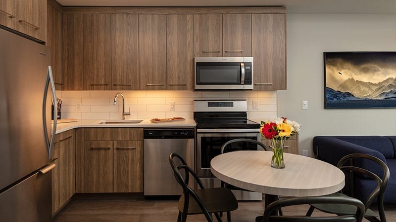 Modern kitchen at the shore, a favourite for kelowna snowbirds 