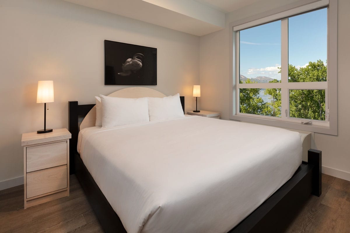 Bedroom with King Size bed in The Shore Kelowna 1 Bedroom Suite with den