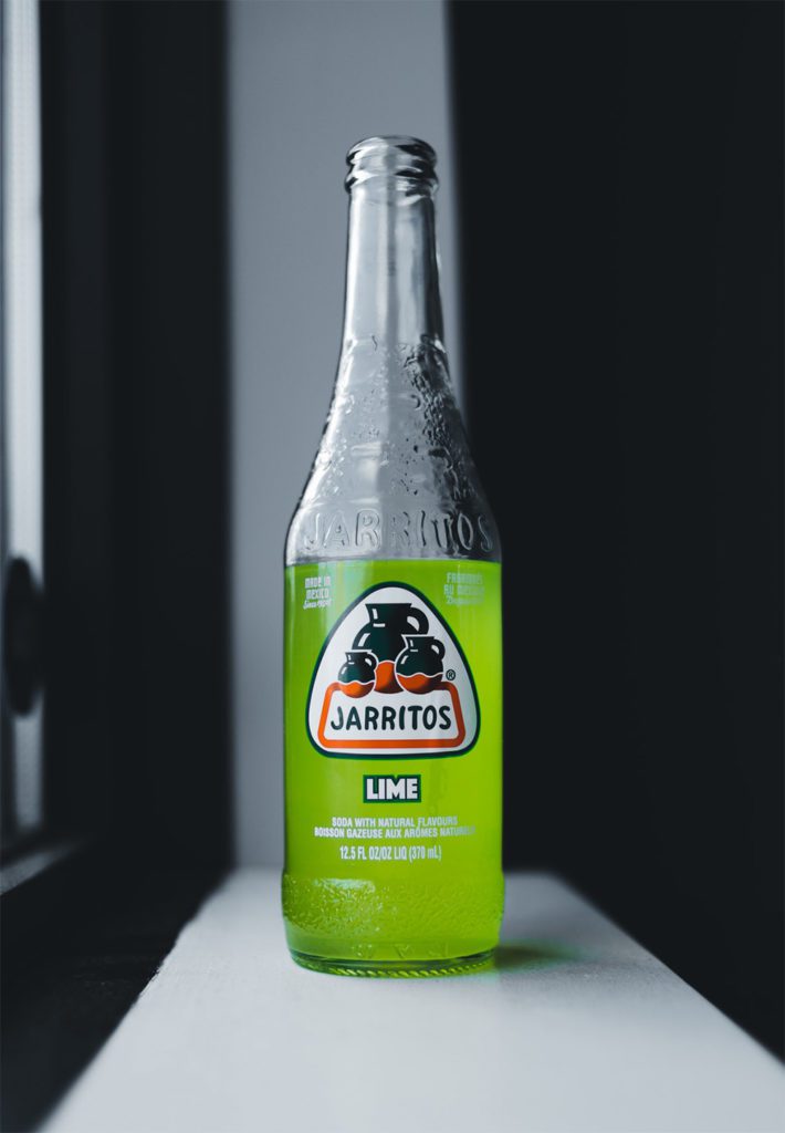 Jarritos bottle on a counter, a popular soft drink imported from Mexico, available in a variety of flavours.